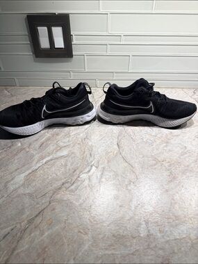 Nike React Infinity Flyknit womens Black and White Athletic Running Shoes